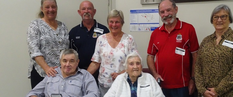 Fairways resident Greg and family with Bundaberg RSL Sub Branch Members Graham and Neil