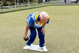 Coastal Waters resident Doug Logan playing bowls at 95