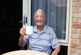 Centenarian George enjoying a cup of tea