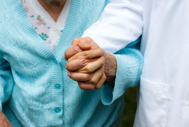 Hand holding cardigan lady.jpg