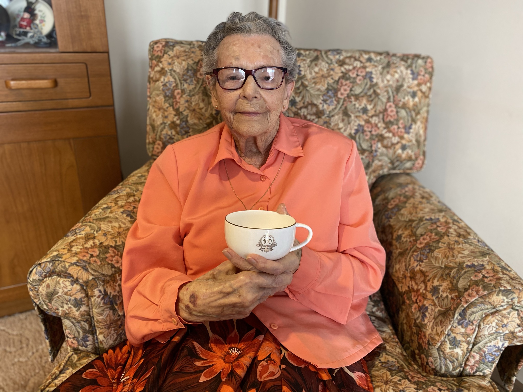 Irene Lyall with teacup.JPEG