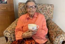 Irene Lyall with teacup.JPEG