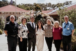 Raffles team and the happy couple on their wedding day