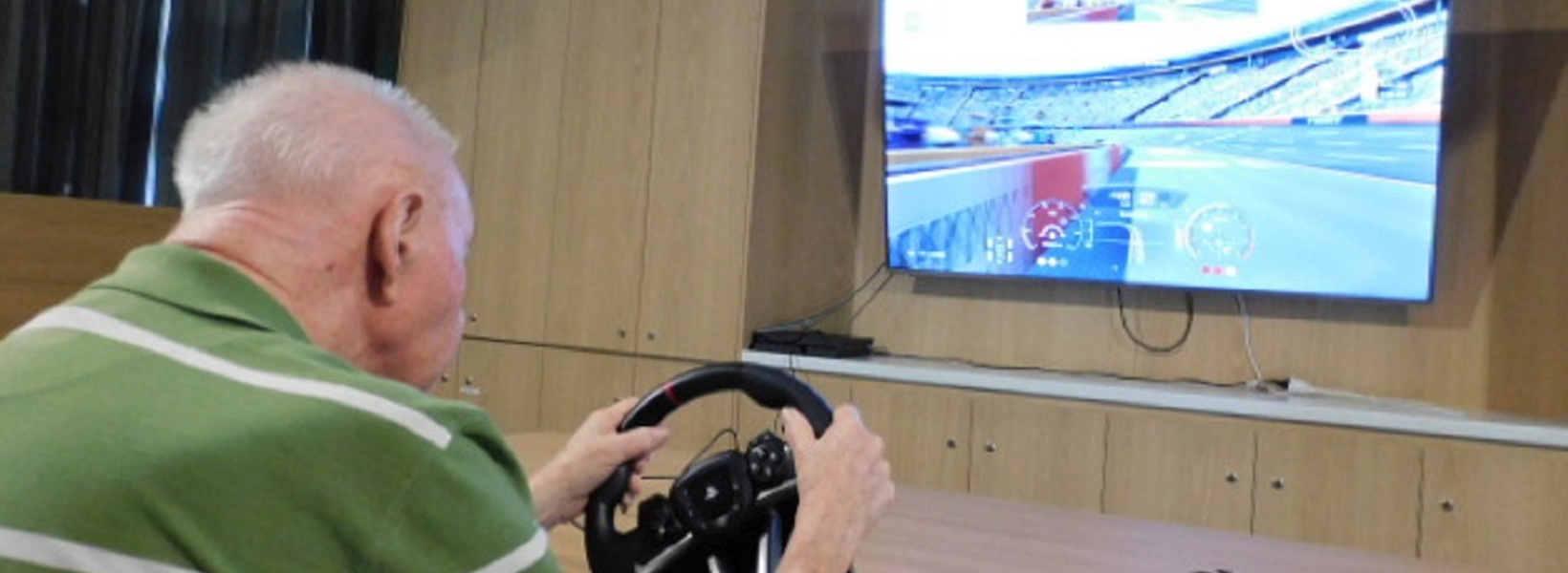 Allan driving with the PS4 simulator.jpg Allan driving with the PS4 simulator.jpg