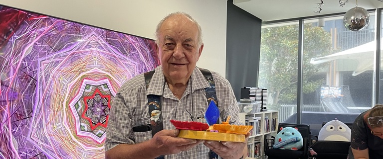 Ian showcasing his handmade crystals.jpg Ian showcasing his handmade crystals.jpg