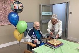 Mervyn and his wife celebrating his birthday together