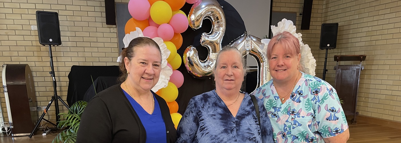 Sharon celebrating with her team.jpg