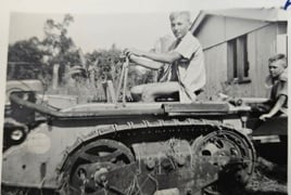Charles on the tractor pulling the trough Charles on the tractor pulling the trough