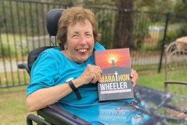 Heather Coombes with book_crop.jpeg Heather Coombes with book_crop.jpeg