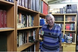 Gus in his home library_.jpg Gus in his home library_.jpg